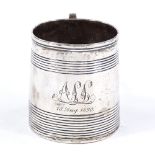 A George III silver christening mug, of tapered cylindrical form, with banded body, hallmarks London