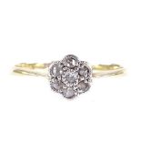 An 18ct gold rose-cut diamond flowerhead ring, with platinum-top settings, setting height 6.5mm,