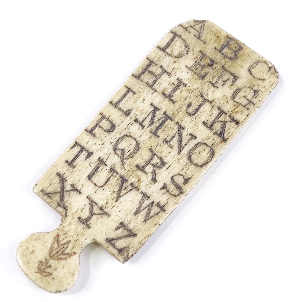 A Napoleonic prisoner of war carved bone alphabet board, engraved letters to both sides, with floral - Image 2 of 3