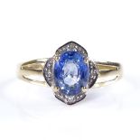 An 18ct gold sapphire and diamond dress ring, with pierced shoulders, setting height 11mm, size N,