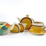 A Clarice Cliff Bizarre Tea for Two set, with brown/orange banded decoration, teapot height 13cm,