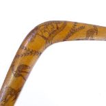 An Australian Aboriginal boomerang with engraved decoration