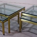 2 pairs of Italian nesting coffee tables, thick glass tops on brushed brass bases, the smaller of