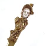 A gilt-bronze and ivory paper knife, circa 1900, the handle in the form of a woman with a basket