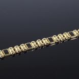 A 14ct gold black enamel panel bracelet, length 21cm, 2.13g