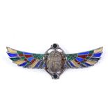 A Continental silver Egyptian revival style winged scarab brooch, with plique a jour enamel
