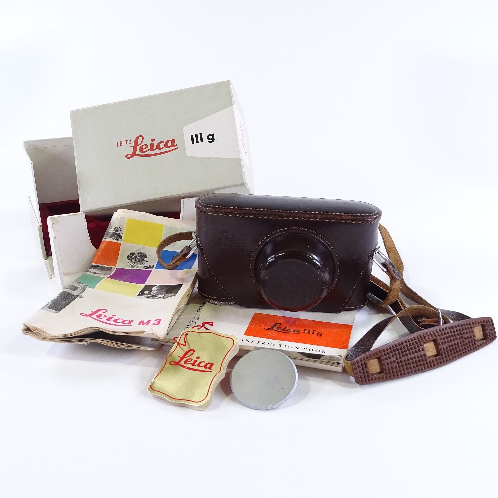 A Leica 111G camera, serial no. 968523, with original Leica lens, leather case, original box, and - Image 4 of 4