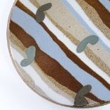 Jane Hamlyn (British - born 1940), an experimental salt-glaze stoneware plate, with coloured banding