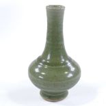 A Chinese celadon green glaze porcelain narrow-necked vase, height 16cm