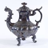 A French? silver chocolate pot of bulbous form, with gurgle fish spout and ivory spacers to handle