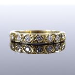 An 18ct gold diamond half-eternity ring, total diamond content approx 0.2ct, band width 3.3mm,