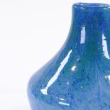 A Monart blue/turquoise flecked glass vase, height 20cm
