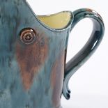 Walter Keeler (British born 1942), Wealden glaze jug with maker's mark, height 15cm, good condition,