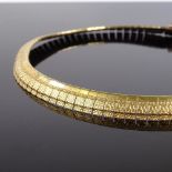 A 9ct gold textured panel collar necklace, length 39cm, 29.8g