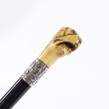 A carved ivory tiger-head design handled ebony walking cane, with silver collar, hallmarks London