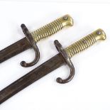 A pair of 19th century French sword bayonets, length 69cm