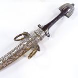 An Arab dagger with ornate brass and white metal-mounted scabbard, overall length 40cm