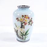 A Japanese prunus design enamel vase, height 12cm