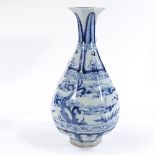A Chinese blue and white porcelain narrow-necked dragon vase, height 28cm