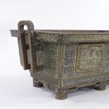 A Chinese 19th century bronze rectangular 2-handled planter, with relief-cast side panels, length