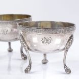 A pair of 19th century Italian silver salts, with lion paw feet and gilt interiors, marks to base,