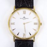 BAUME & MERCIER - An 18ct gold Classima Quartz wristwatch, with white ceramic dial and quarter
