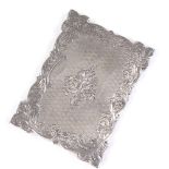A Victorian rectangular silver card case, with engraved foliate and engine turned decoration, by
