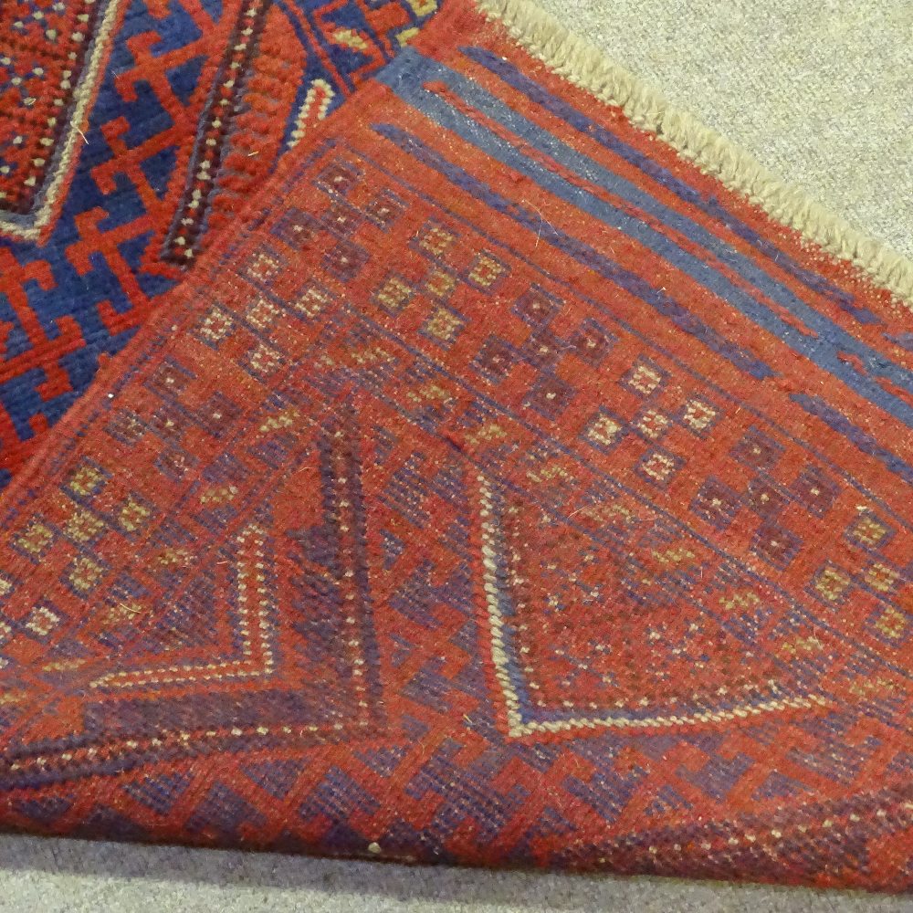 A handmade Meshwani runner, blue and red ground, 7'11" x 2' - Image 4 of 4