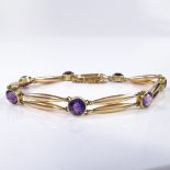 A 15ct gold amethyst set bracelet, internal diameter 62mm, 10.8g