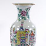 A Chinese white glaze porcelain vase, with painted enamel designs, height 43cm, rim A/F