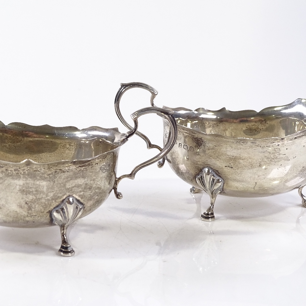 A pair of silver gravy boats, with scalloped rims and hoofed feet, by Adie Brothers Ltd, hallmarks - Image 5 of 6