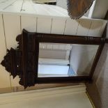 A 19th century French carved oak framed wall mirror, overall height 5'2" width 3'3"