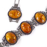 A silver and amber 5-section panel bracelet, length 20cm, together with a matching pendant
