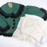 A Victorian silk lady's jacket, green stripe pattern with black beaded fringes, together with a