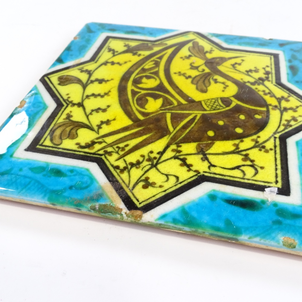 An Islamic turquoise/yellow glaze tile with peacock design, 19.5cm across - Image 2 of 3