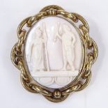 A relief carved cameo panel brooch, depicting Classical male and female, in gilt-metal frame,