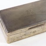 A rectangular silver cigarette box, by Alfred Deeley, hallmarks Birmingham 1928, length 16cm