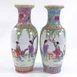 A pair of Chinese Republic porcelain vases, decorated with figures in gardens, height 31cm