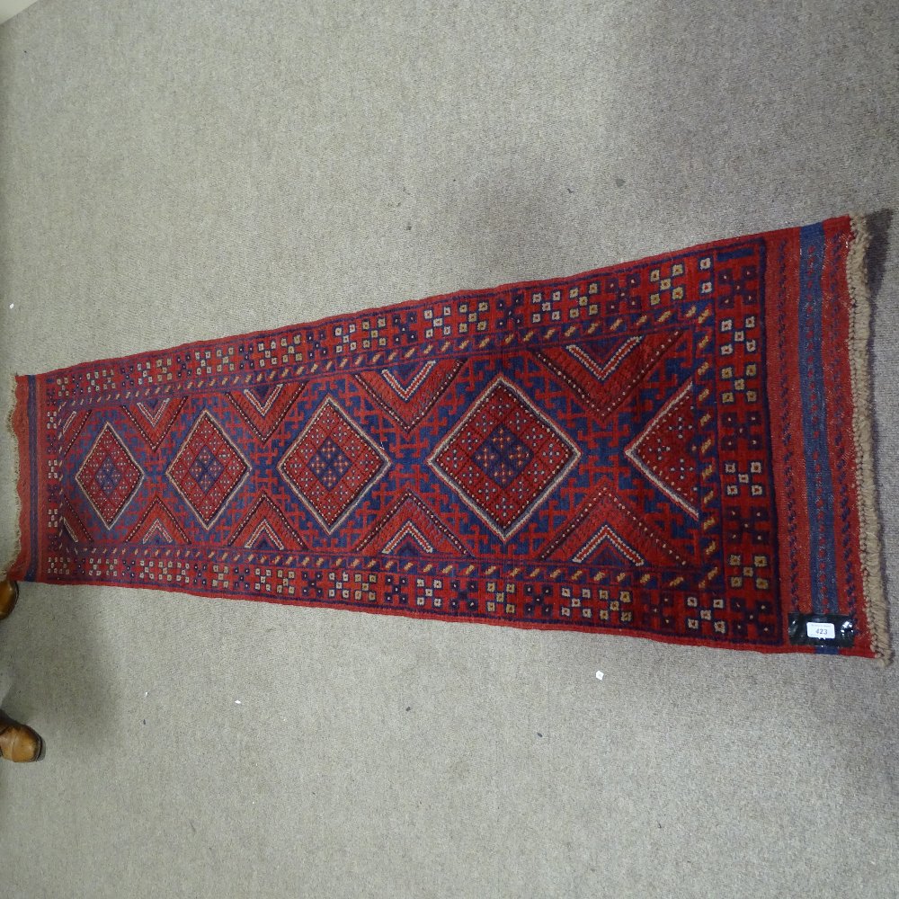 A handmade Meshwani runner, blue and red ground, 7'11" x 2' - Image 2 of 4