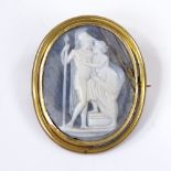 An Antique relief carved hardstone cameo brooch, depicting Roman Centurion and maiden, in unmarked