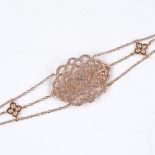 A silver rose gilt cubic zirconia panel bracelet, with stylised openwork settings, length 20cm, 10.