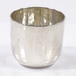 A Cartier sterling silver beaker of plain cylindrical form, with gilt interior, model no. 902,