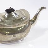 An oval silver teapot, of bulbous form, by Barker Brothers Silver Ltd, hallmarks Birmingham 1932,