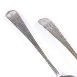 2 Georgian silver serving spoons, with bright-cut engraved handles, hallmarks London 1783 and