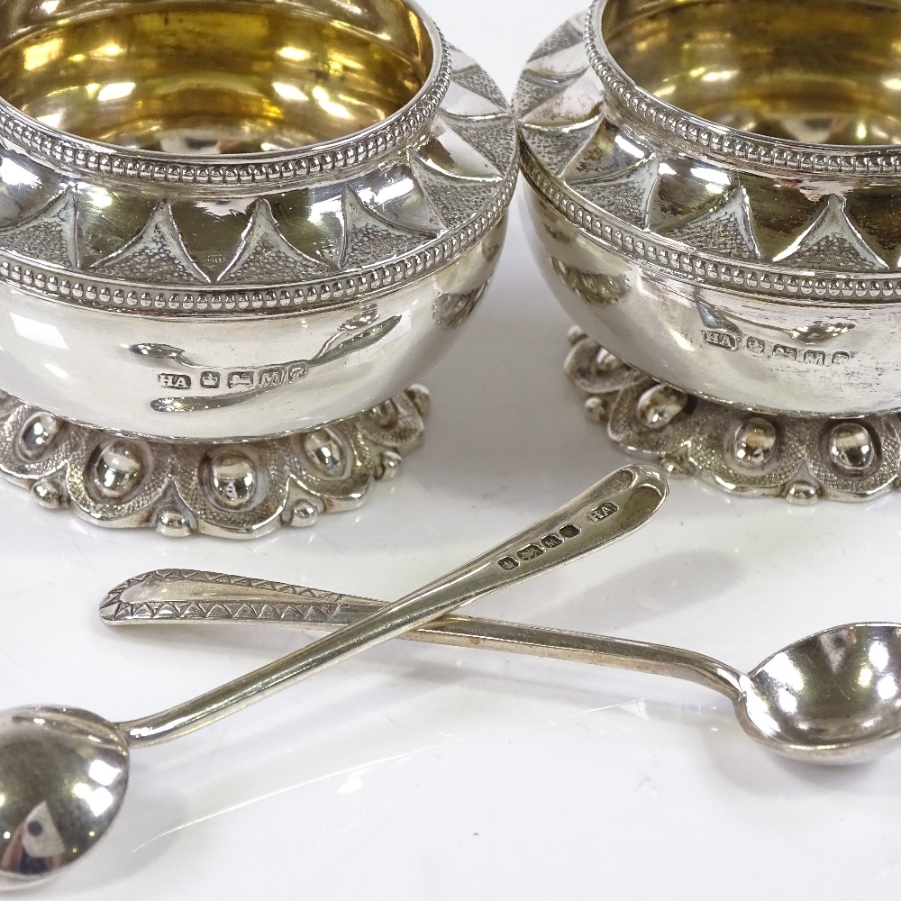 A pair of Victorian circular silver salts, with beaded rim, textured neck, and gilt interiors, by - Image 3 of 3