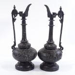 A pair of 19th century patinated spelter ewers on marble bases, height 27cm