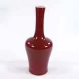 A Chinese red glaze porcelain narrow-necked vase, 6 character mark, height 25cm