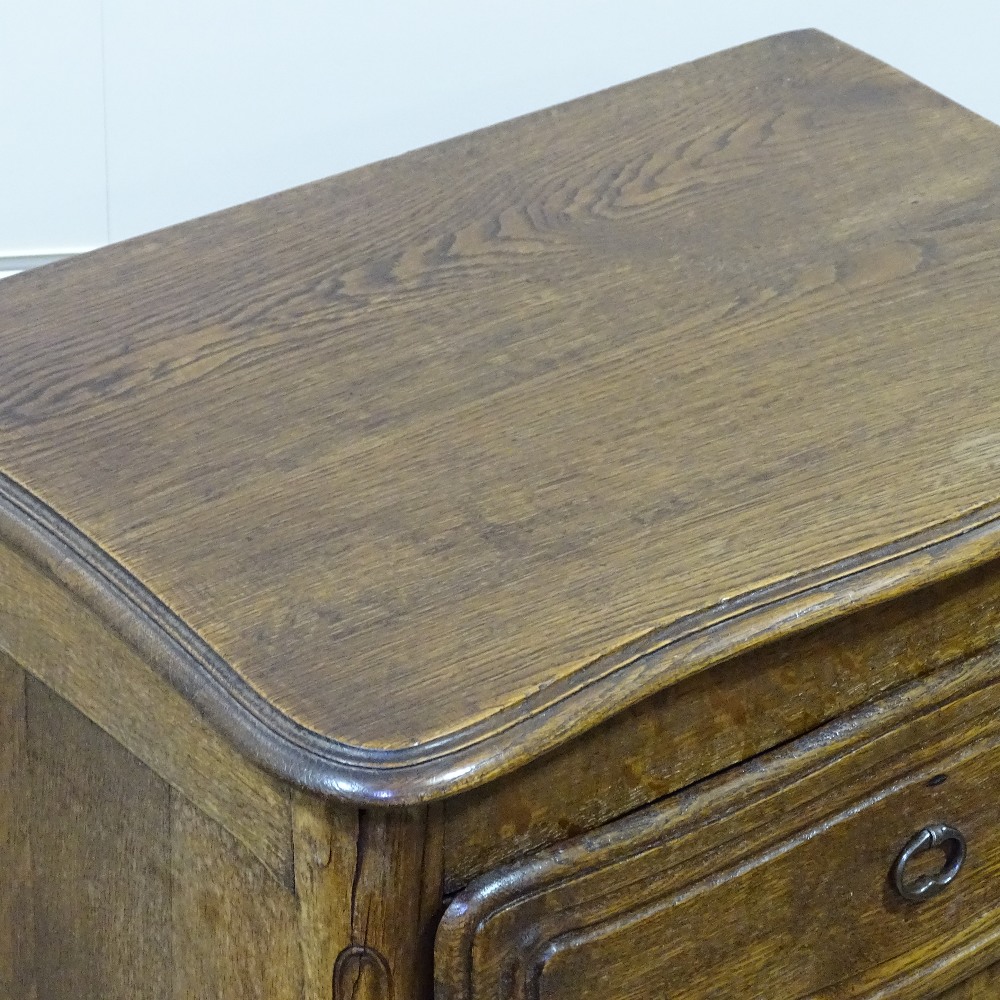 A French narrow oak chest of 4 drawers, with shaped top and carved drawer fronts, width 20.5", - Image 5 of 8