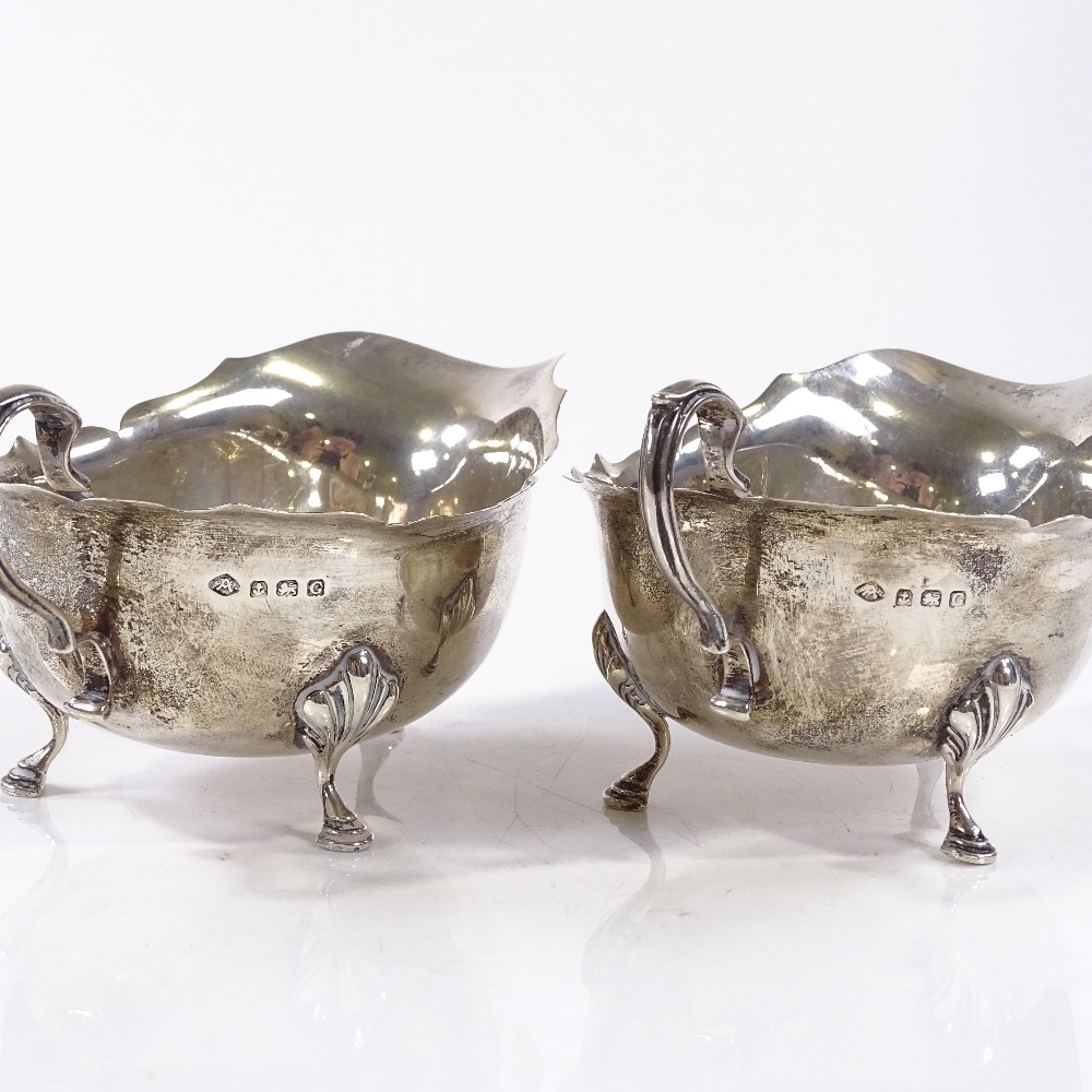 A pair of silver gravy boats, with scalloped rims and hoofed feet, by Adie Brothers Ltd, hallmarks - Image 2 of 6