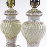 A pair of Continental porcelain table lamps with gilded decoration, overall height 60cm